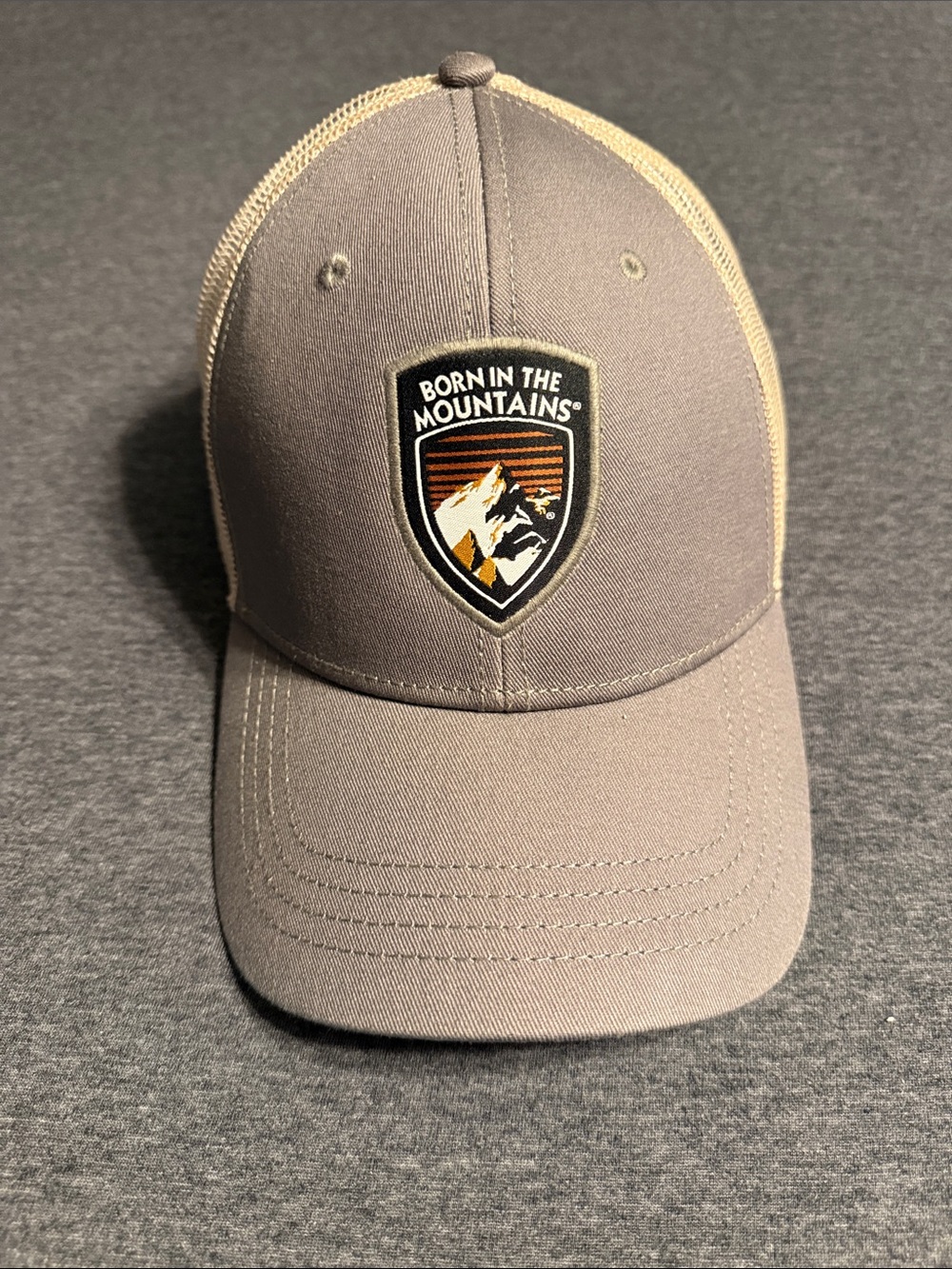Kuhl Gray and Beige Born in the Mountains Trucker Cap